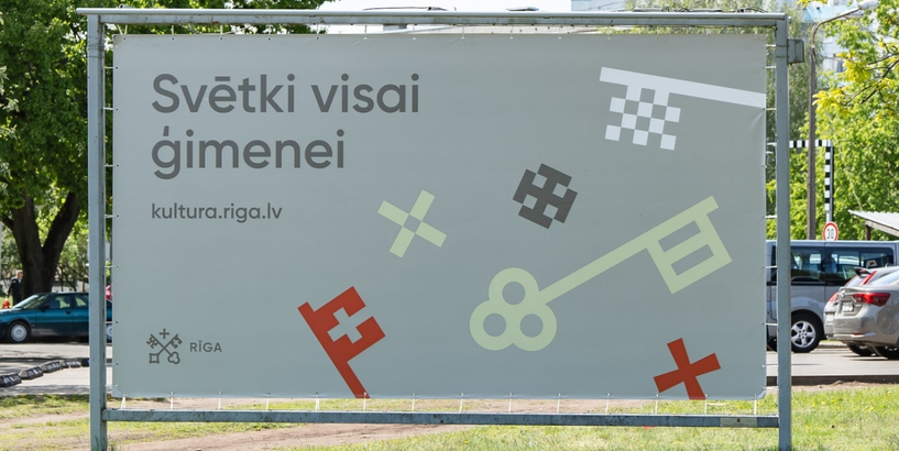 Ģimmenes dienas plakāts pilsētvidē
